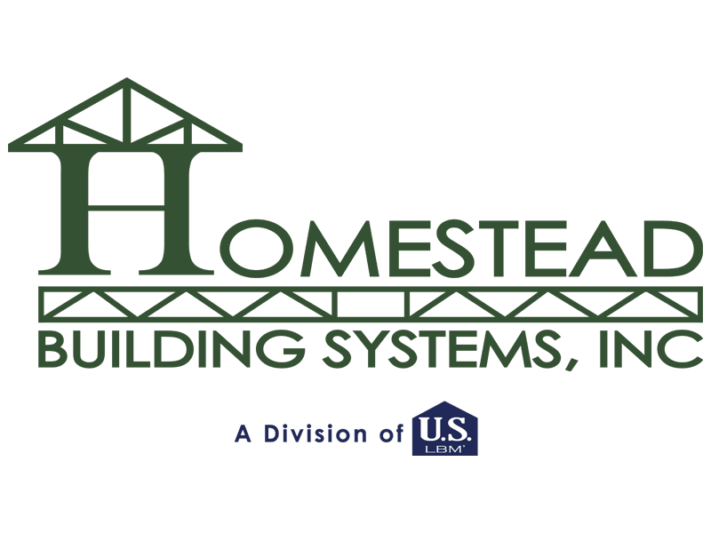 Close-up of framing lumber at a residential construction site, with wooden beams and trusses under a clear blue sky.