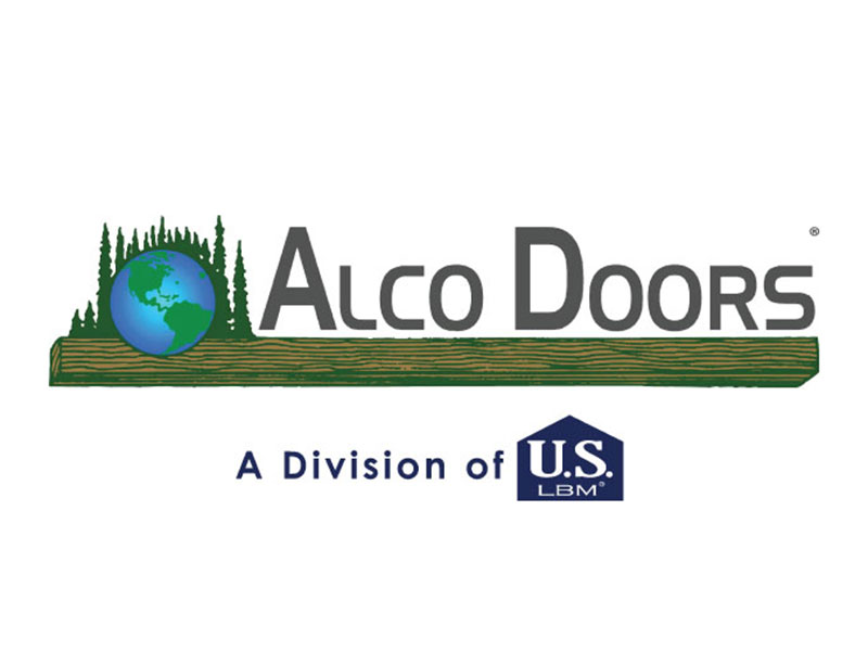 Close-up of framing lumber at a residential construction site, with wooden beams and trusses under a clear blue sky.