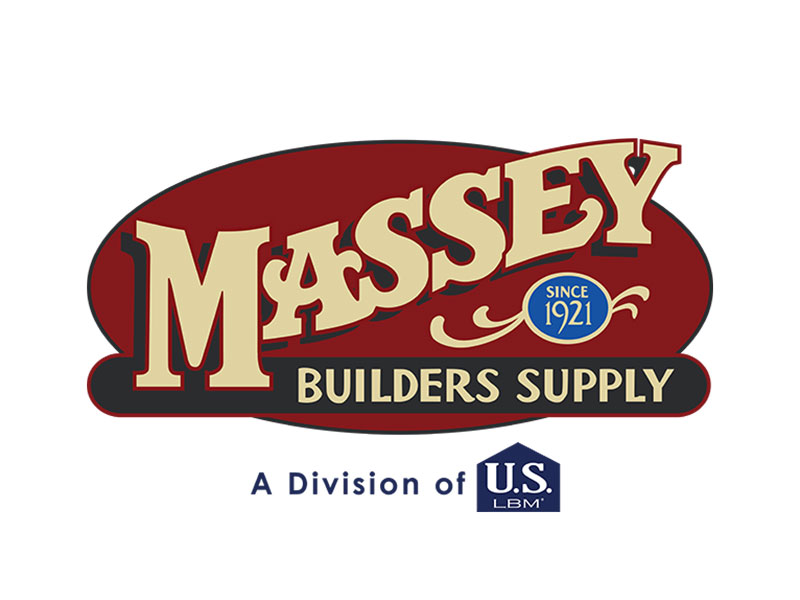 Close-up of framing lumber at a residential construction site, with wooden beams and trusses under a clear blue sky.